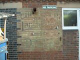 Ghost sign for Chrysler, Lanchester, & Daimler Servicing on Avenue Road Extension