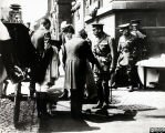 Photograph of King George V and Queen Mary on visit to Corah factory, 1919
